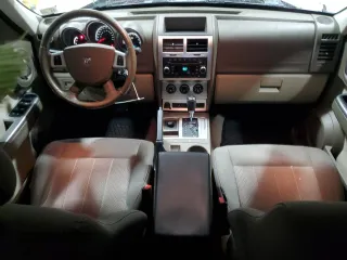 2010 Dodge Nitro SXT with VIN 1D4PU5GK2AW129723, listed as a Copart auction lot 47230535 with 228,701 mi miles and Salvage Title. Bid and sale history available at DreamBid. Image 8.