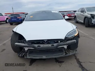 2021 Tesla Model S Long Range with VIN 5YJSA1E57MF453815, listed as a IAAI auction lot 41818700 with 51,176 mi miles and . Bid and sale history available at DreamBid. Image 13.