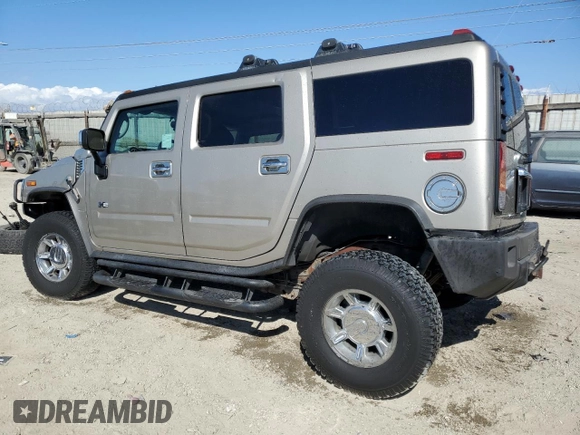 2003 Hummer H2 with VIN 5GRGN23U93H132656, listed as a Copart auction lot 71987404 with 152,287 mi miles and Salvage Title. Bid and sale history available at carsss.com. Image 2.