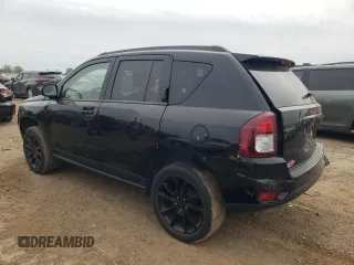 2014 Jeep Compass Altitude with VIN 1C4NJCBA8ED730183, listed as a Copart auction lot 73128034 with 76,993 mi miles and Salvage Title. Bid and sale history available at carsss.com. Image 2.