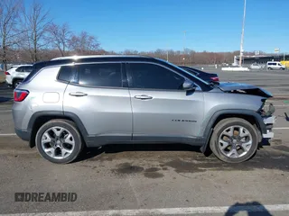 2018 Jeep Compass Limited with VIN 3C4NJCCB6JT489123, listed as a IAAI auction lot 41824477 with 101,291 mi miles and . Bid and sale history available at DreamBid. Image 13.