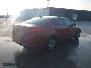 2011 Kia Optima LX with VIN KNAGM4A72B5072570, listed as a IAAI auction lot 41802542 with 188,922 mi miles. Bid and sale history available at carsss.com. Image 4.