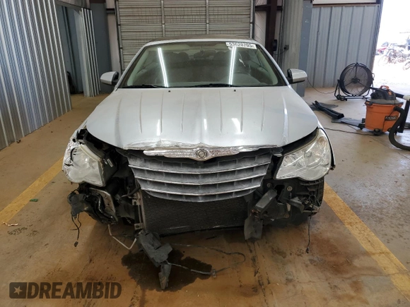 2008 Chrysler Sebring Touring z VIN 1C3LC55R08N271099, wystawiony jako Copart lot #53620705 z przebiegiem 134 637 mil mil oraz Szkoda całkowita • Salvage title. Historia ofert i sprzedaży dostępna na DreamBid. Obrazek 5.