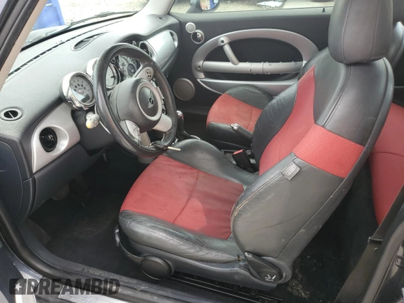 2005 MINI Hardtop with VIN WMWRC33595TJ72148, listed as a Copart auction lot 54310325 with 189,243 mi miles and Salvage title. Bid and sale history available at DreamBid. Image 7.