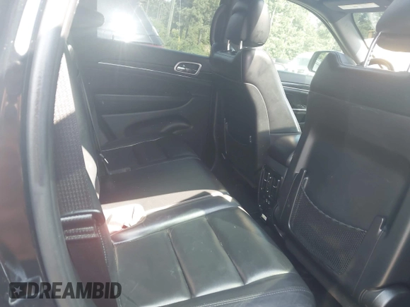 2019 Jeep Grand Cherokee Limited with VIN 1C4RJEBG7KC698975, listed as a IAAI auction lot 42700203 with 145,022 mi miles and . Bid and sale history available at DreamBid. Image 8.