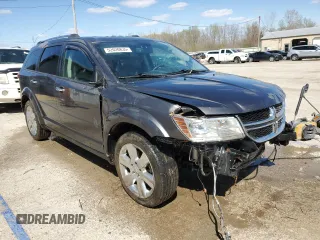 2014 Dodge Journey Limited with VIN 3C4PDDDG4ET202173, listed as a Copart auction lot 52020835 with 124,624 mi miles and Salvage Title. Bid and sale history available at carsss.com. Image 4.
