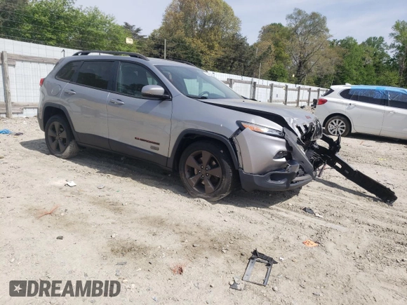 2016 Jeep Cherokee 75th Anniversary with VIN 1C4PJLCB5GW256619, listed as a Copart auction lot 53648575 with 98,969 mi miles and Salvage Title. Bid and sale history available at DreamBid. Image 4.
