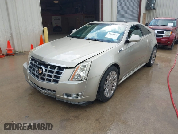 2013 Cadillac CTS Coupe Premium with VIN 1G6DS1E36D0107566, listed as a IAAI auction lot 42079197 with 122,386 mi miles. Bid and sale history available at carsss.com. Image 17.