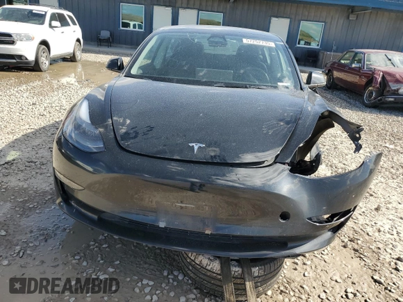 2023 Tesla Model 3 with VIN 5YJ3E1EAXPF708001, listed as a Copart auction lot 57252735 with 71,579 mi miles and Salvage title. Bid and sale history available at DreamBid. Image 5.