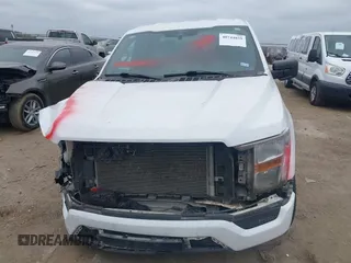 2023 Ford F-150 XL with VIN 1FTEX1CP9PKD57496, listed as a IAAI auction lot 40744859 with 56,487 mi miles and . Bid and sale history available at DreamBid. Image 12.