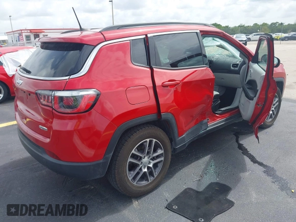 2019 Jeep Compass Latitude with VIN 3C4NJCBB8KT843811, listed as a IAAI auction lot 42442207 with 83,608 mi miles and . Bid and sale history available at DreamBid. Image 4.