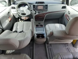 2011 Toyota Sienna XLE with VIN 5TDDK3DC1BS010411, listed as a Copart auction lot 51213065 with 174,214 mi miles and Salvage title. Bid and sale history available at DreamBid. Image 8.