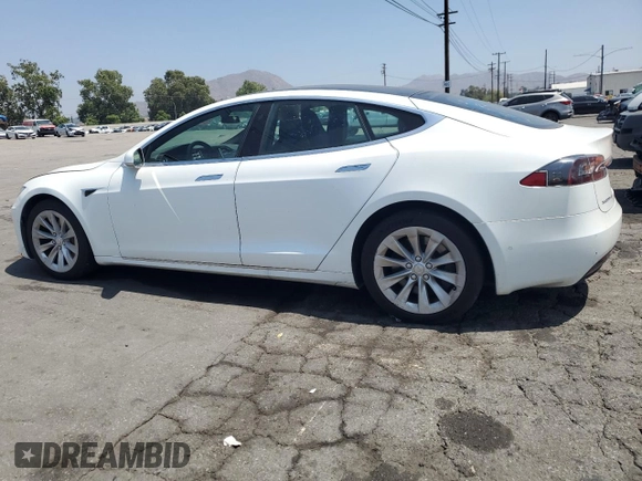 2017 Tesla Model S 60 with VIN 5YJSA1E16HF198903, listed as a Copart auction lot 60601565 with Not provided miles and Clean title. Bid and sale history available at DreamBid. Image 2.