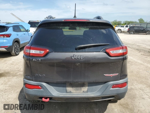 2017 Jeep Cherokee Trailhawk with VIN 1C4PJMBS0HW589626, listed as a Copart auction lot 53981435 with 105,318 mi miles and Salvage title. Bid and sale history available at DreamBid. Image 6.