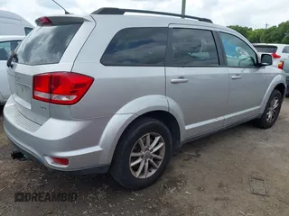 2013 Dodge Journey SXT with VIN 3C4PDDBG4DT571469, listed as a IAAI auction lot 42104433 with 166,068 mi miles and . Bid and sale history available at DreamBid. Image 4.