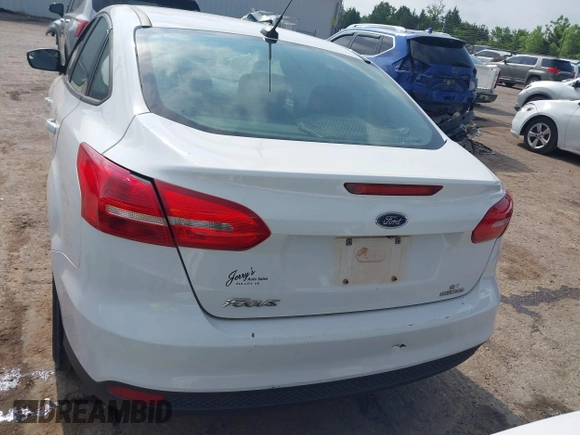 2015 Ford Focus SE with VIN 1FADP3F22FL376042, listed as a IAAI auction lot 42283236 with 76,675 mi miles and . Bid and sale history available at DreamBid. Image 16.