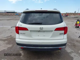 2017 Honda Pilot Touring with VIN 5FNYF6H9XHB034001, listed as a IAAI auction lot 42092549 with 142,422 mi miles and . Bid and sale history available at DreamBid. Image 16.