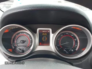 2014 Dodge Journey SXT with VIN 3C4PDCBG1ET127798, listed as a IAAI auction lot 41799898 with 178,873 mi miles and . Bid and sale history available at DreamBid. Image 7.