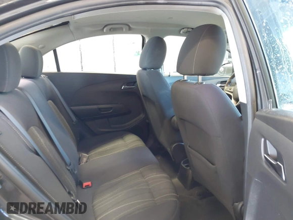 2014 Chevrolet Sonic LT z VIN 1G1JC5SH2E4199864, wystawiony jako IAAI lot #42370631 z przebiegiem 59 781 mil mil oraz . Historia ofert i sprzedaży dostępna na DreamBid. Obrazek 8.