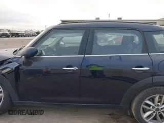 2013 MINI Countryman S with VIN WMWZC3C59DWP24390, listed as a IAAI auction lot 42038509 with 134,903 mi miles and . Bid and sale history available at DreamBid. Image 15.