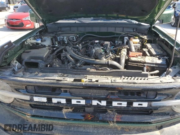 2023 Ford Bronco z VIN 1FMDE5CP1PLB73958, wystawiony jako Copart lot #58026345 z przebiegiem Nie podano mil oraz Szkoda całkowita • Salvage title. Historia ofert i sprzedaży dostępna na DreamBid. Obrazek 11.