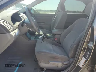2005 Toyota Camry STD with VIN JTDBE32KX53029392, listed as a Copart auction lot 65439115 with 77,464 mi miles and Salvage title. Bid and sale history available at DreamBid. Image 7.
