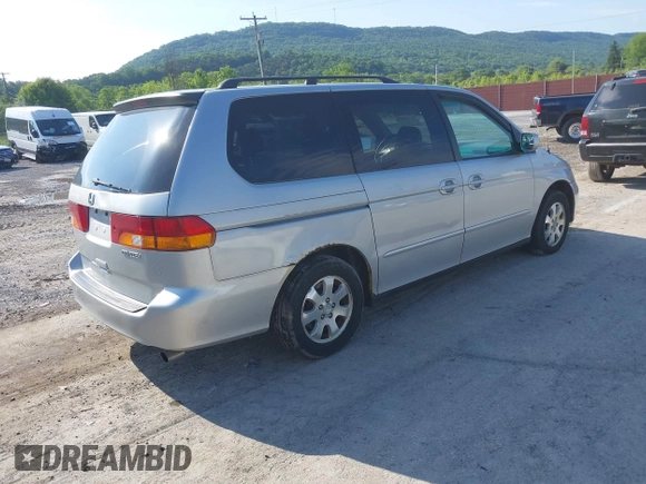 2004 Honda Odyssey EX z VIN 5FNRL18614B037143, wystawiony jako IAAI lot #42362262 z przebiegiem 203 023 mil mil oraz . Historia ofert i sprzedaży dostępna na DreamBid. Obrazek 4.