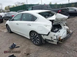 2018 Nissan Altima SR with VIN 1N4AL3AP7JC174856, listed as a IAAI auction lot 42070366 with 135,680 mi miles and . Bid and sale history available at carsss.com. Image 3.