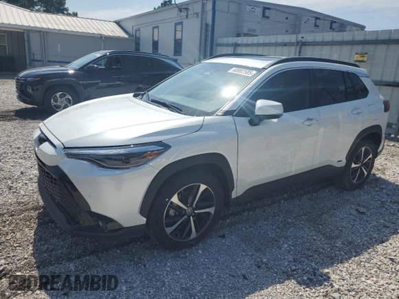 2023 Toyota Corolla Cross Hybrid S with VIN 7MUFBABG5PV008595, listed as a Copart auction lot 60002585 with 9,052 mi miles and Salvage title. Bid and sale history available at DreamBid. Image 1.