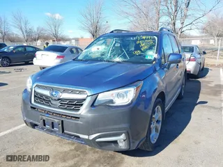 2018 Subaru Forester Touring with VIN JF2SJAWCXJH467976, listed as a IAAI auction lot 41744472 with 98,919 mi miles. Bid and sale history available at carsss.com. Image 6.