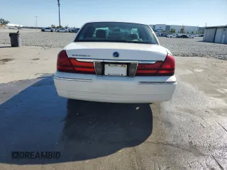 2003 Mercury Grand Marquis GS Convenience z VIN 2MEFM74W13X607924, wystawiony jako Copart lot #48960815 z przebiegiem 141 975 mil mil oraz Szkody całkowita. Historia ofert i sprzedaży dostępna na DreamBid. Obrazek 6.