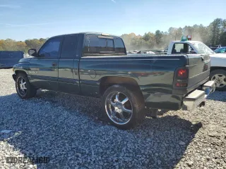 1999 Dodge Ram 1500 with VIN 3B7HC13Y4XG240711, listed as a Copart auction lot 80141094 with 239,956 mi miles and Salvage Title. Bid and sale history available at carsss.com. Image 2.