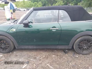 2016 MINI Convertible with VIN WMWWG5C51G3C19231, listed as a IAAI auction lot 42246342 with 93,876 mi miles and . Bid and sale history available at DreamBid. Image 14.