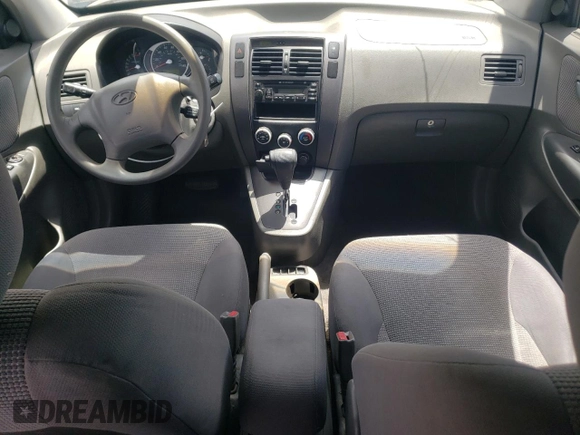 2006 Hyundai Tucson GL with VIN KM8JM12B66U342188, listed as a Copart auction lot 63140444 with 168,587 mi miles and Salvage Title. Bid and sale history available at carsss.com. Image 8.