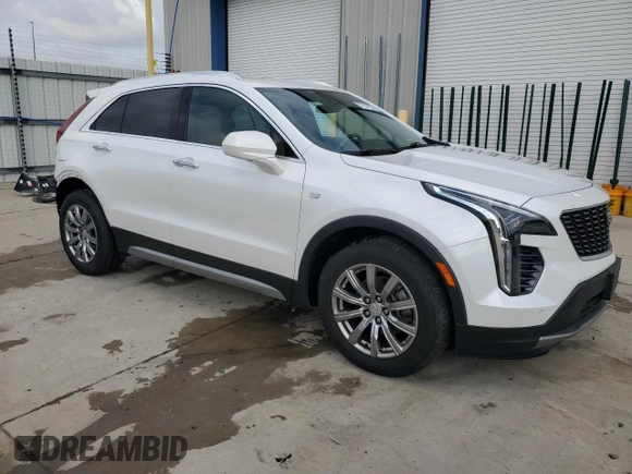2019 Cadillac XT4 FWD Premium Luxury with VIN 1GYFZCR43KF151044, listed as a Copart auction lot 57912915 with 71,138 mi miles and Salvage title. Bid and sale history available at DreamBid. Image 4.