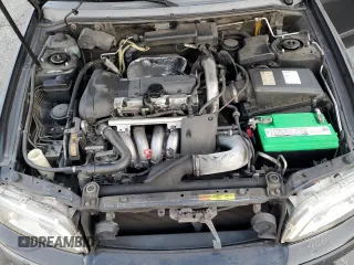 2001 Volvo V40 z VIN YV1VW29551F747214, wystawiony jako Copart lot #44844735 z przebiegiem 183 144 mil mil oraz Tytuł czysty. Historia ofert i sprzedaży dostępna na DreamBid. Obrazek 11.