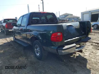 2002 Ford F-150 XLT with VIN 1FTRW07672KB47813, listed as a IAAI auction lot 41788462 with 234,684 mi miles. Bid and sale history available at carsss.com. Image 3.