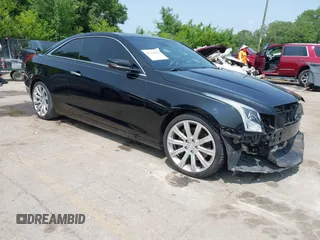 2016 Cadillac ATS Luxury Collection RWD z VIN 1G6AB1RX5G0112861, wystawiony jako IAAI lot #42334120 z przebiegiem 97 459 mil mil oraz . Historia ofert i sprzedaży dostępna na DreamBid. Obrazek 1.
