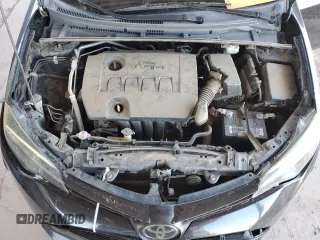 2019 Toyota Corolla L z VIN 5YFBURHEXKP931597, wystawiony jako Copart lot #57115745 z przebiegiem 154 146 mil mil oraz Szkoda całkowita • Salvage title. Historia ofert i sprzedaży dostępna na DreamBid. Obrazek 11.
