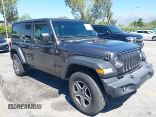 2022 Jeep Wrangler Unlimited Sport S z VIN 1C4HJXDG6NW134306, wystawiony jako IAAI lot #42206796 z przebiegiem 45 303 mil mil oraz . Historia ofert i sprzedaży dostępna na DreamBid. Obrazek 1.