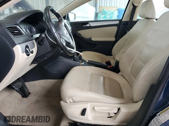 2013 Volkswagen Jetta SE with VIN 3VWDP7AJXDM379392, listed as a Copart auction lot 61598235 with 119,005 mi miles and Salvage title. Bid and sale history available at DreamBid. Image 7.