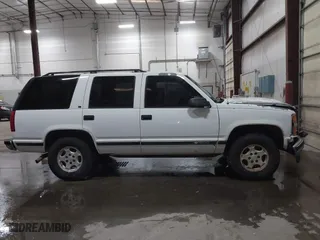 1996 Chevrolet Tahoe with VIN 1GNEK13R5TJ341299, listed as a IAAI auction lot 41713489 with 251,990 mi miles. Bid and sale history available at carsss.com. Image 13.