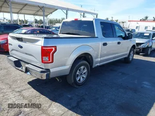 2015 Ford F-150 XLT with VIN 1FTEW1C8XFKE17196, listed as a IAAI auction lot 41414904 with 150,866 mi miles and . Bid and sale history available at carsss.com. Image 4.