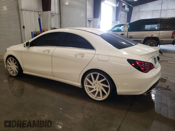 2015 Mercedes-Benz CLA 250 with VIN WDDSJ4GB5FN189122, listed as a Copart auction lot 57647115 with 118,038 mi miles and Salvage title. Bid and sale history available at DreamBid. Image 2.
