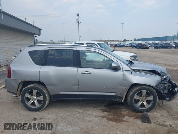 2016 Jeep Compass High Altitude with VIN 1C4NJDEBXGD730764, listed as a IAAI auction lot 42371491 with 125,302 mi miles and . Bid and sale history available at DreamBid. Image 13.