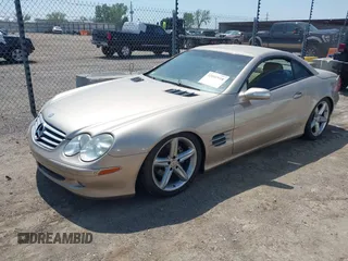 2004 Mercedes-Benz SL 500 z VIN WDBSK75F34F071610, wystawiony jako IAAI lot #42042918 z przebiegiem Nie podano mil oraz . Historia ofert i sprzedaży dostępna na DreamBid. Obrazek 17.