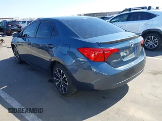 2019 Toyota Corolla L with VIN 2T1BURHE3KC207010, listed as a IAAI auction lot 42004596 with 106,188 mi miles and . Bid and sale history available at DreamBid. Image 3.