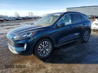 2020 Ford Escape Titanium Hybrid с VIN 1FMCU9DZXLUB46252, выставлен на аукционе Copart как лот 88801835 с пробегом 64 443 миль миль и Списание • Salvage title. История ставок и продаж доступна на DreamBid. Изображение 1.