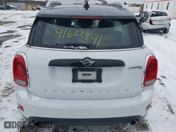 2019 MINI Countryman Cooper S z VIN WMZYT5C57K3G93801, wystawiony jako IAAI lot #41622941 z przebiegiem 66 093 mil mil oraz . Historia ofert i sprzedaży dostępna na DreamBid. Obrazek 16.