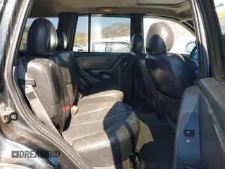 2000 Jeep Grand Cherokee Laredo with VIN 1J4GW48N0YC204645, listed as a IAAI auction lot 42650659 with 217,851 mi miles and . Bid and sale history available at DreamBid. Image 8.